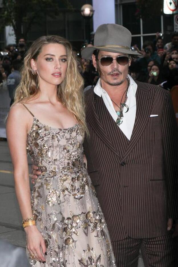 Amber Heard pide una orden de alejamiento a Johnny Depp