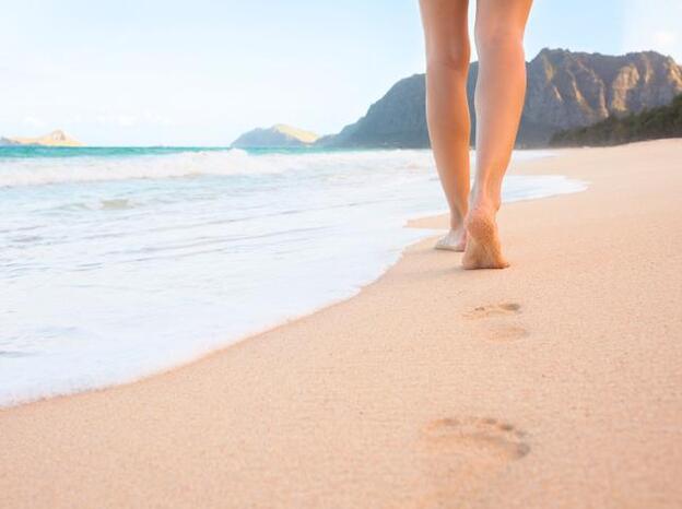 Paseo en la playa/Fotolia