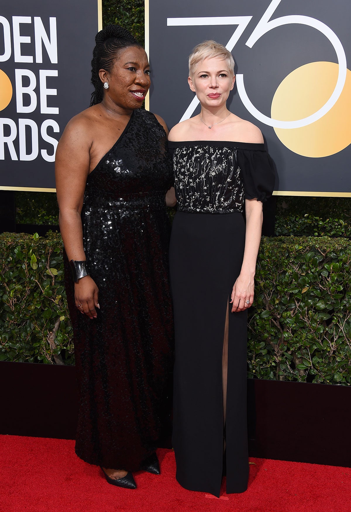 Parejas en la alfombra roja de los Globos de Oro 2018: Tarana Burke y Michelle Williams