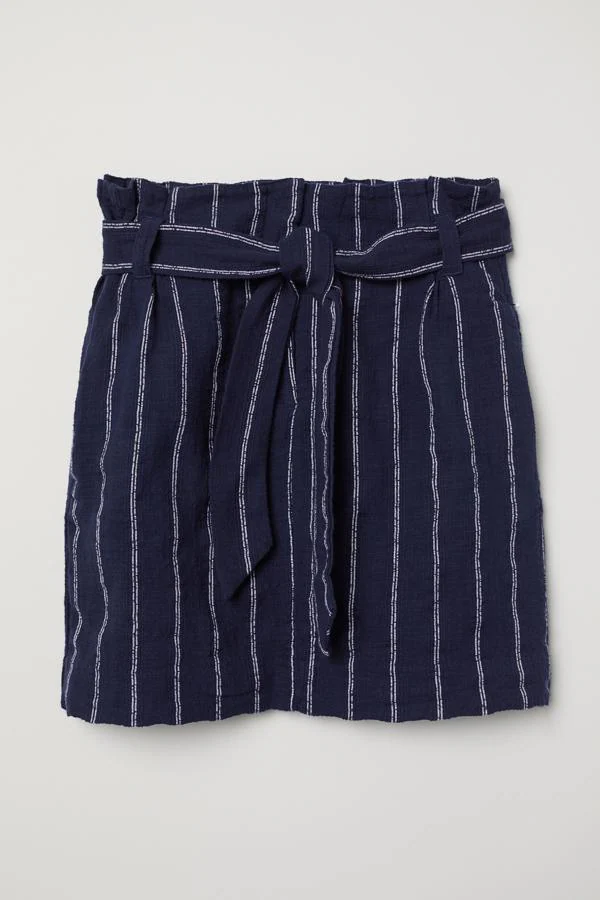 Diez faldas paperbag la tendencia más potente del verano que ahora puedes comprar rebajada