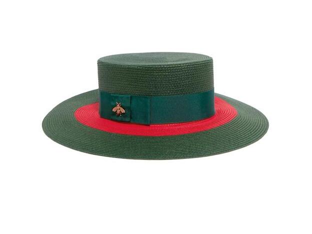 Sombrero de rafia con cinta de tafetán, de Gucci (390 €).