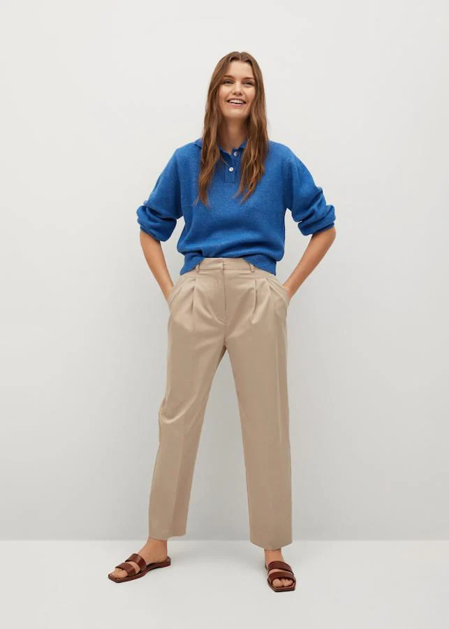 Los pantalones anchos de pinzas en color camel son la tendencia imbatible en el armario de la próxima primavera