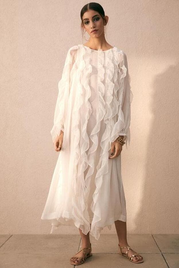 dedo índice jugar En necesidad de El vestido blanco de H&M que rejuvenece a los 50 es este tan bonito y  original que arrasa en Instagram | Mujer Hoy