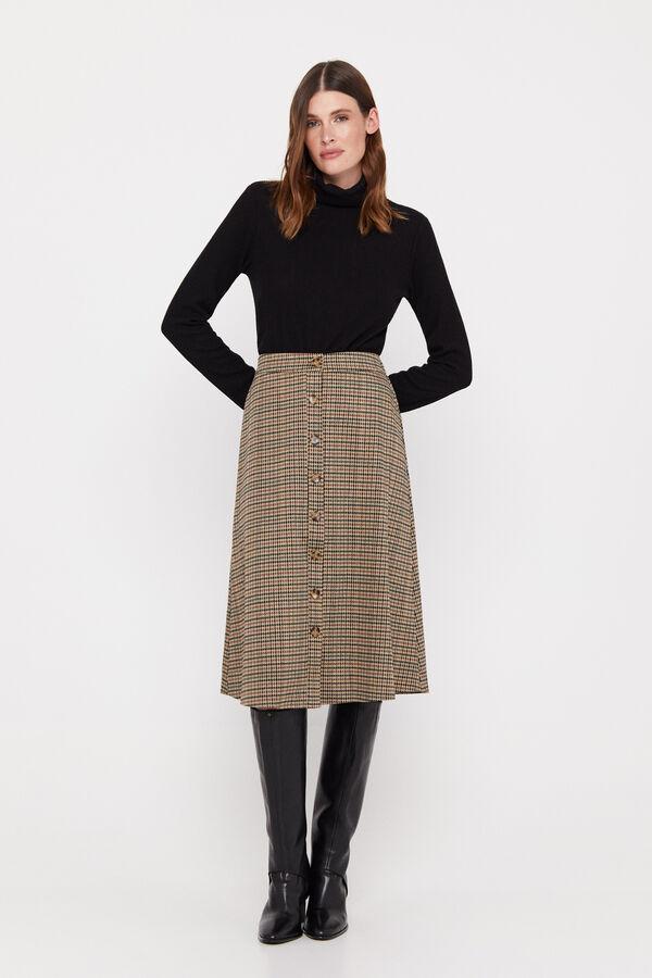 Las 10 faldas con estampado de cuadros que demuestran que es la prenda estrella de la temporada