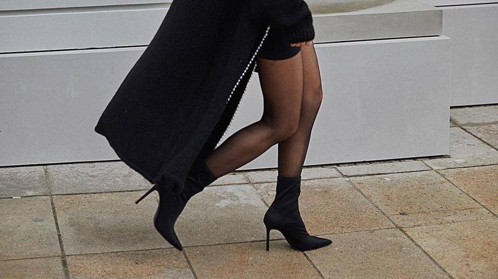 10 botines negros de tacón elegantes que combinan con todo y estilizan el cuerpo