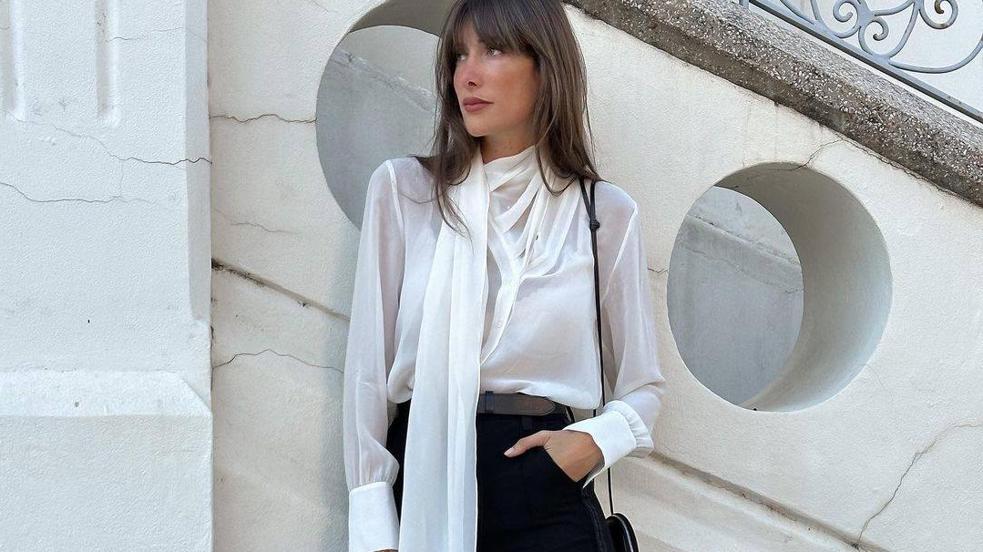 10 blusas blancas elegantes que necesitas para tu fondo de | Mujer