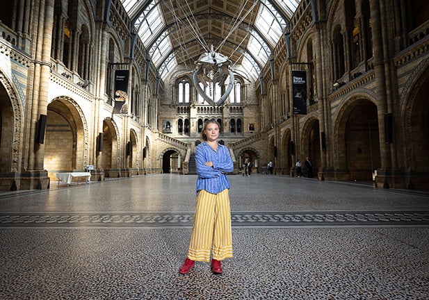 LONDON, ENGLAND - JUNE 27: Climate activist Greta Thunberg poses for photos in the Museum’s central Hintze Hall at Natural History Museum on June 27, 2022 in London, England.  Thunberg teamed up with the Natural History Museum to produce an event for school students centred around biodiversity loss, one of the themes of her forthcoming book, The Climate Book. (Photo by Tim Whitby/Getty Images)/