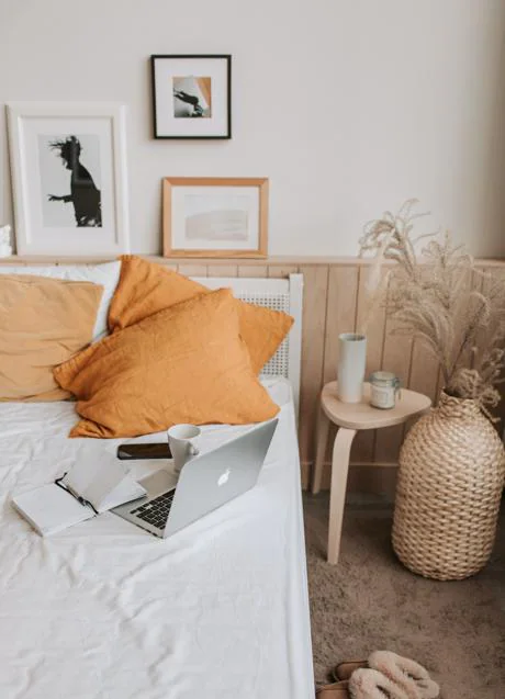 Bedroom decorated with natural motifs and mustard yellow/PEXELS