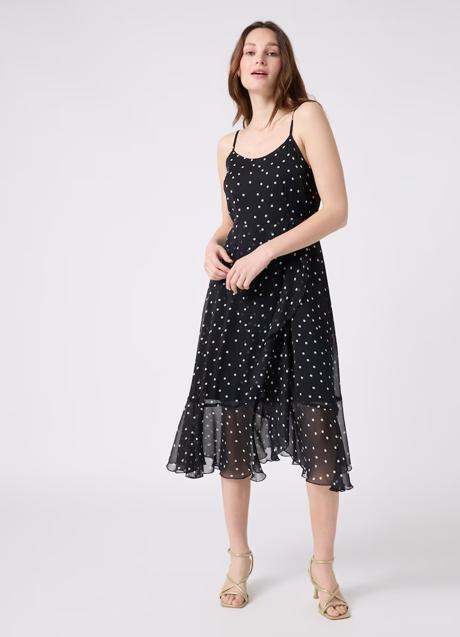 Vestido midi en color negro y lunares de Naf Naf. Foto: El Corte Inglés.