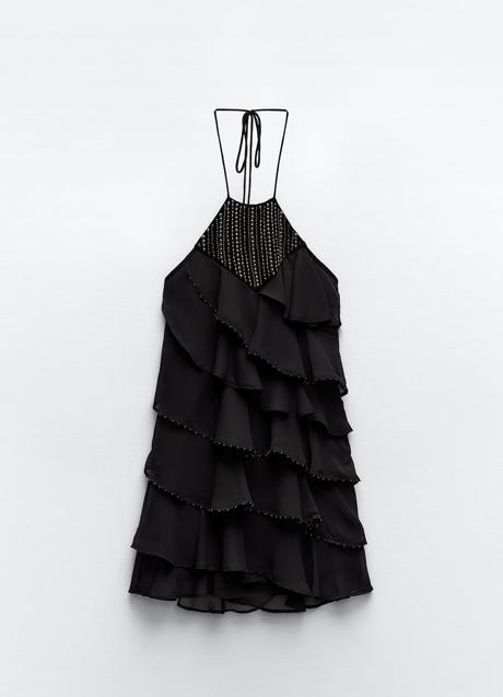 Vestido negro con flecos de Zara (39,99 euros)