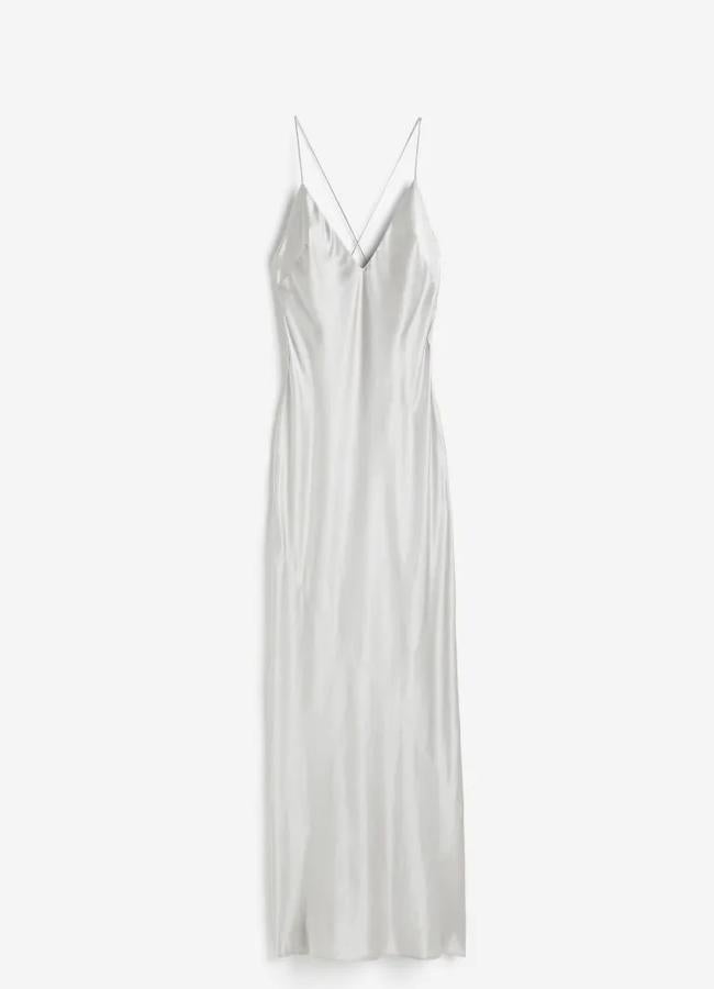 Vestido satinado plateado de H&M, 199 euros.