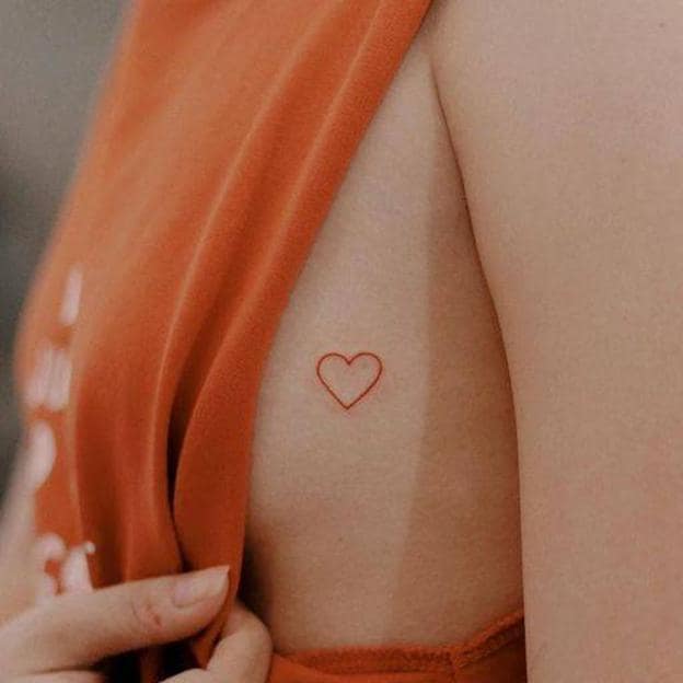 Tatuaje con símbolo de corazón