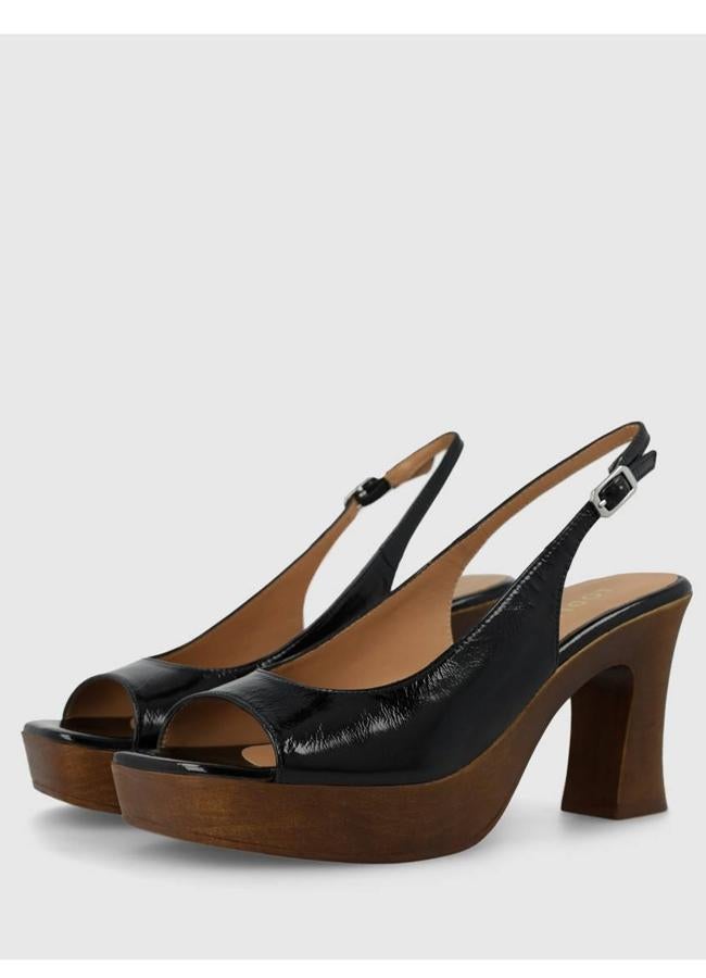 Sandalias con plataforma de madera en piel negra