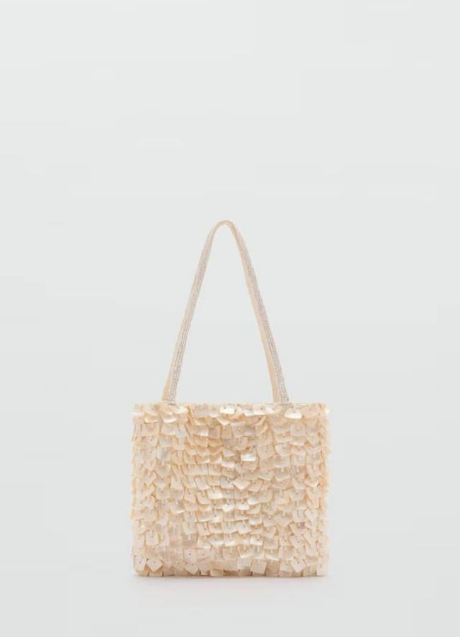 Bolso de mano con detalle de perlas