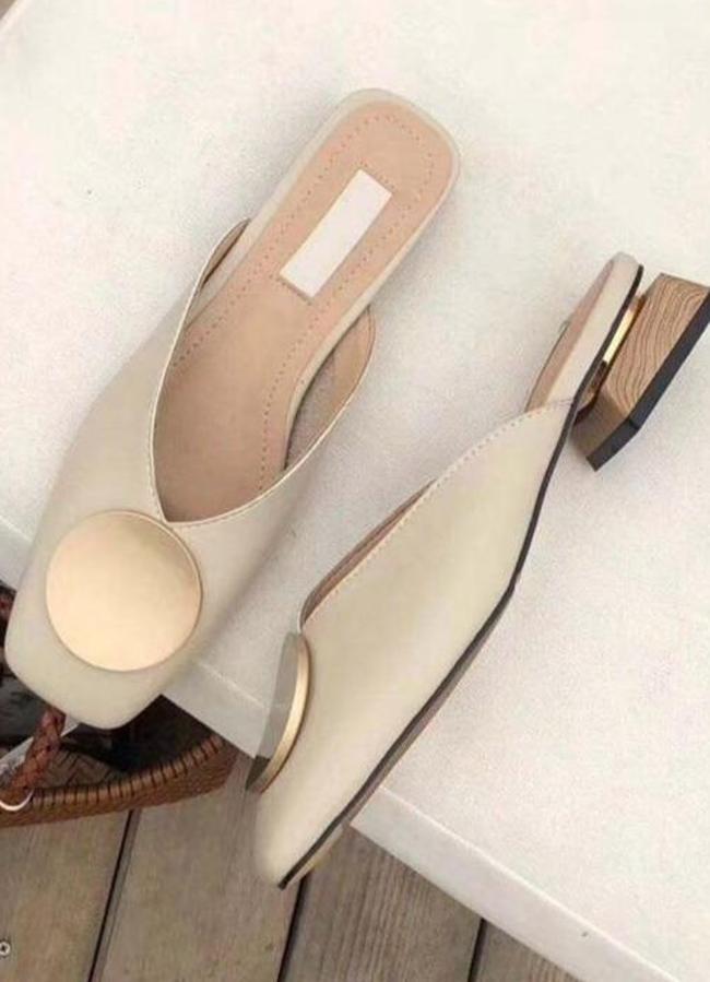 Mules con tacón de madera de Ella Time, 37,99 euros.