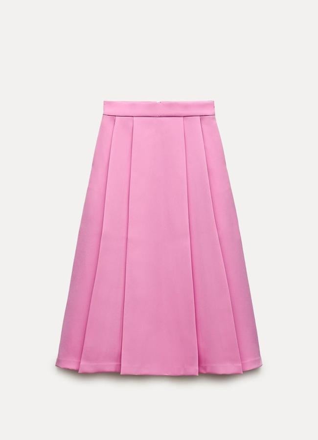 Falda de tablas midi rosa de Zara, 29,99 euros.