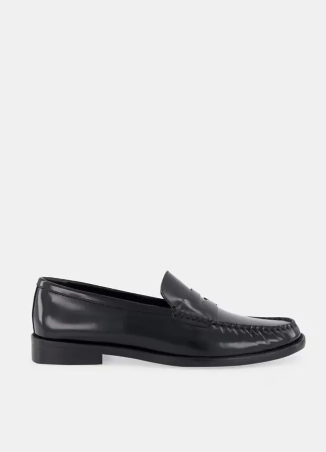 Mocasines planos negros de Latouche, 99 euros.