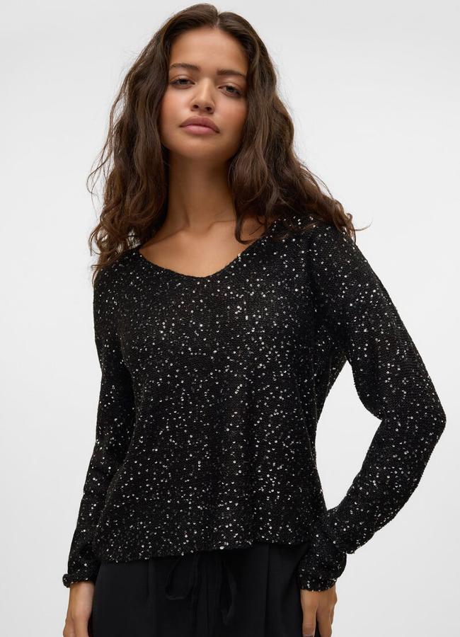 Jersey en negro de lentejuelas de Vero Moda. (29,99 euros).