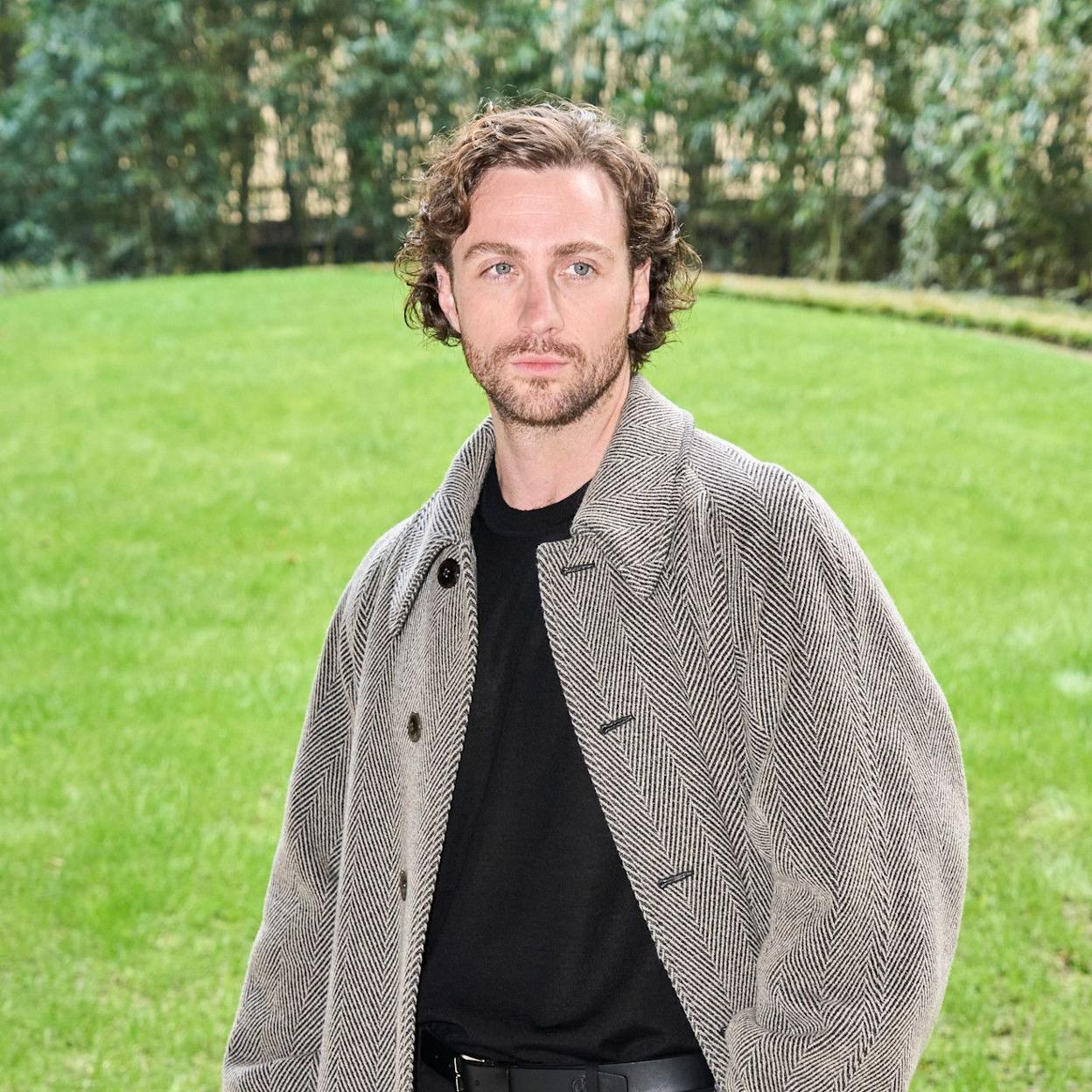 Aaron Taylor-Johnson en desfile de la Semana de la Moda/LAUNCHMETRICS SPOTLIGHT